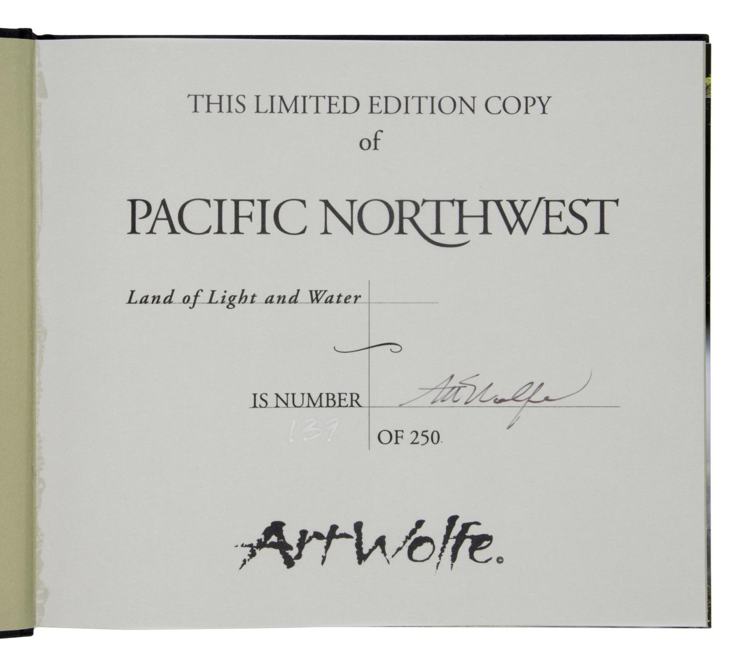 [Photography]. A group of 9 titles, several signed, comprising: