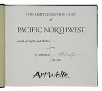 [Photography]. A group of 9 titles, several signed, comprising: