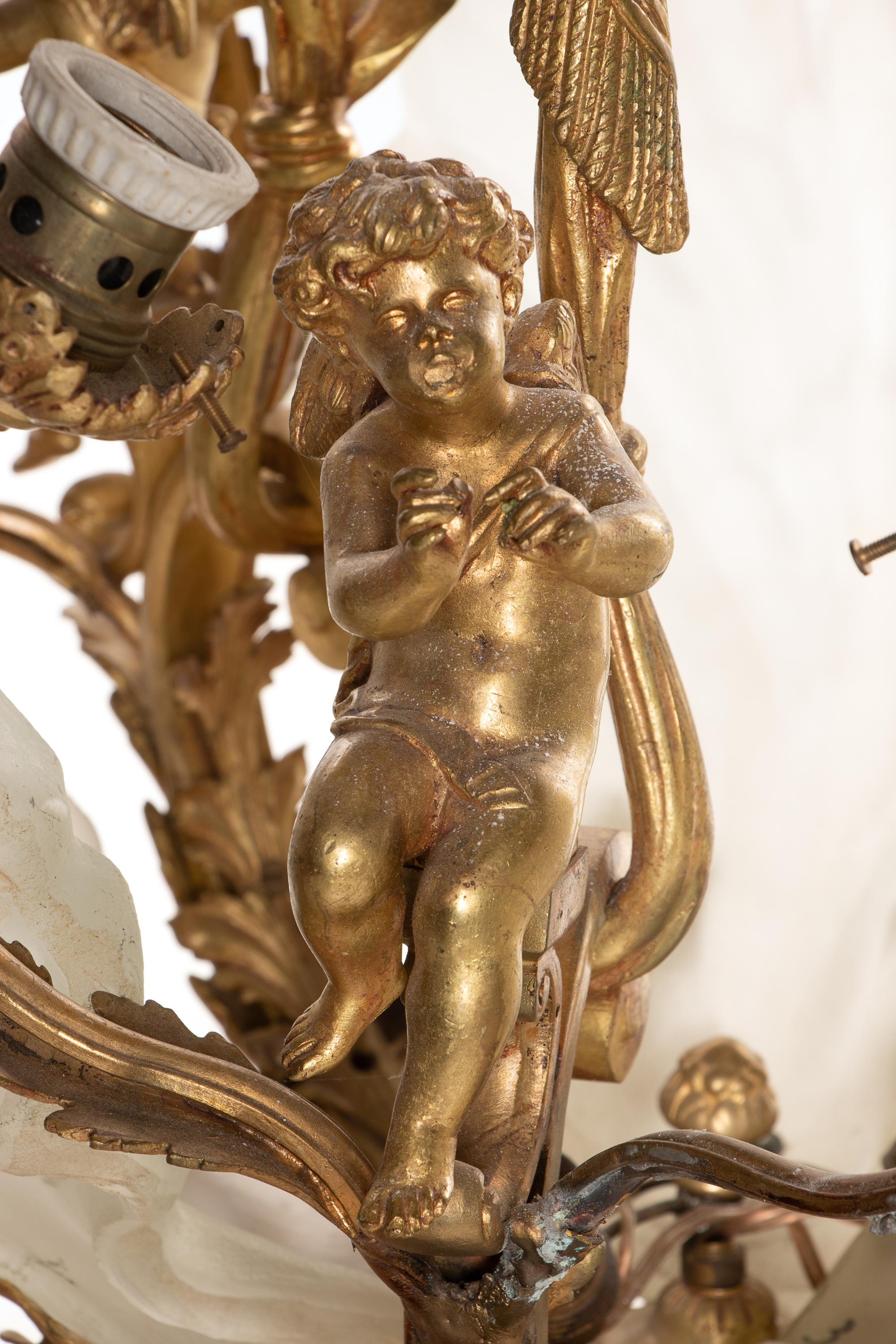 A Louis XV Style Gilt Bronze and Frosted Glass Nine-Light Ceiling Fixture