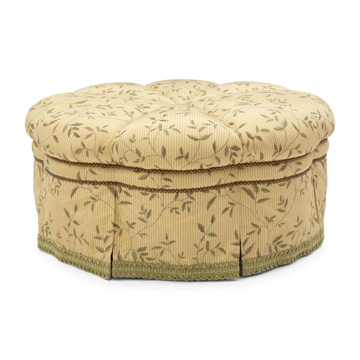 A Custom-Upholstered Circular Ottoman