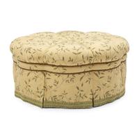A Custom-Upholstered Circular Ottoman