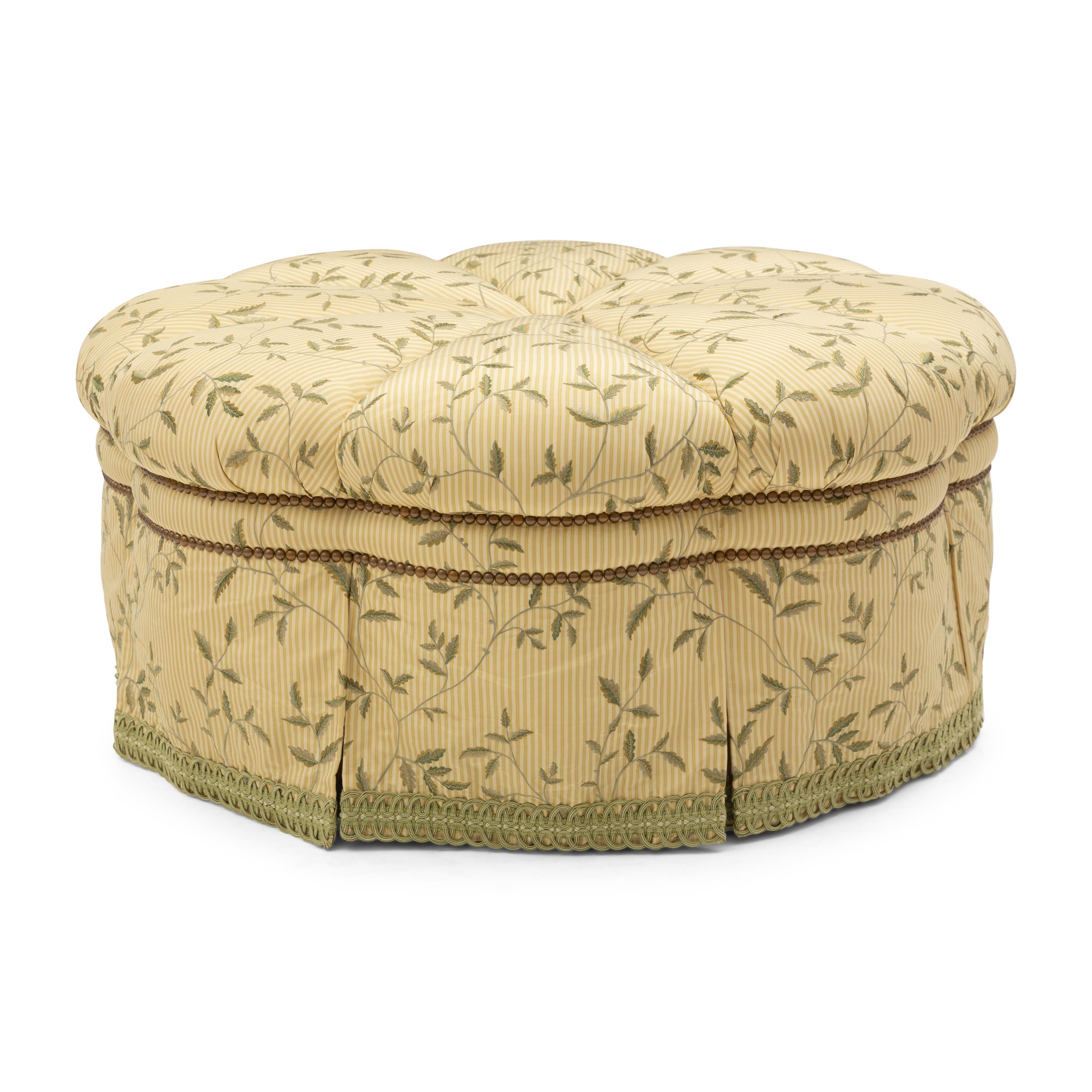 A Custom-Upholstered Circular Ottoman