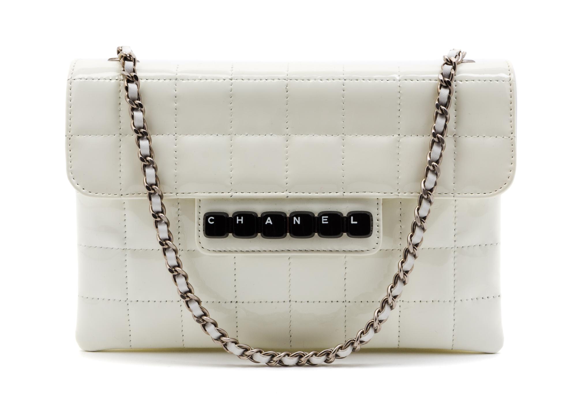 A Chanel Ivory Patent Leather Digital Flap Bag, 8 x 5 1/2 x 1 inches.