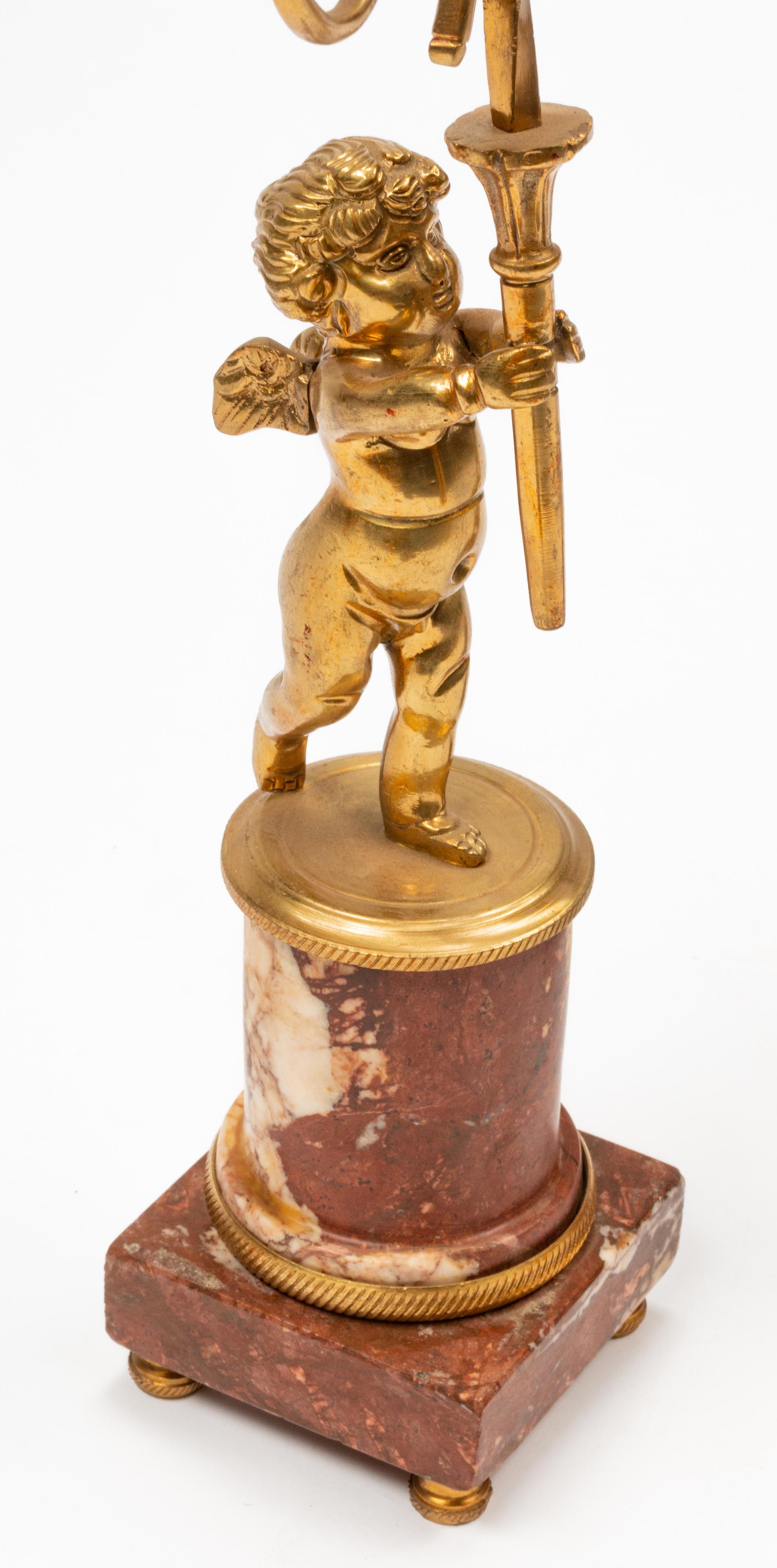 A Pair of Empire Style Gilt Bronze Two-Light Candelabra on Marble Bases