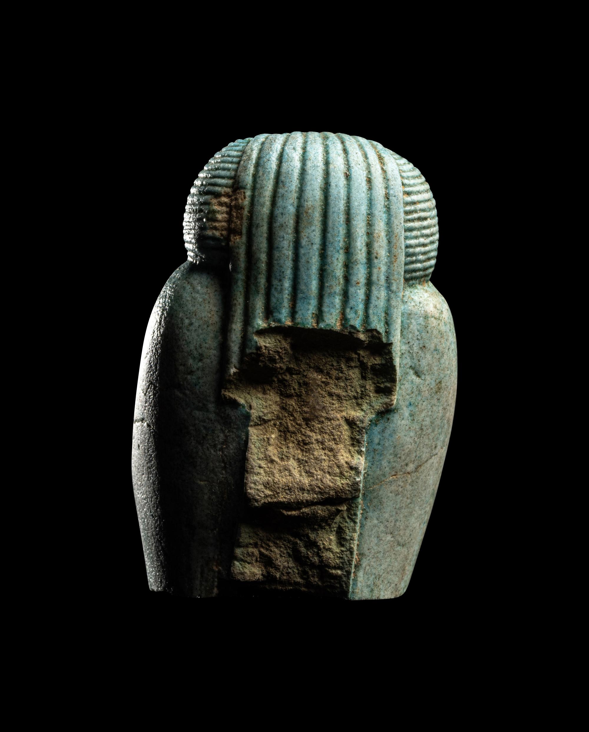 An Egyptian Faience Kneeling Baboon