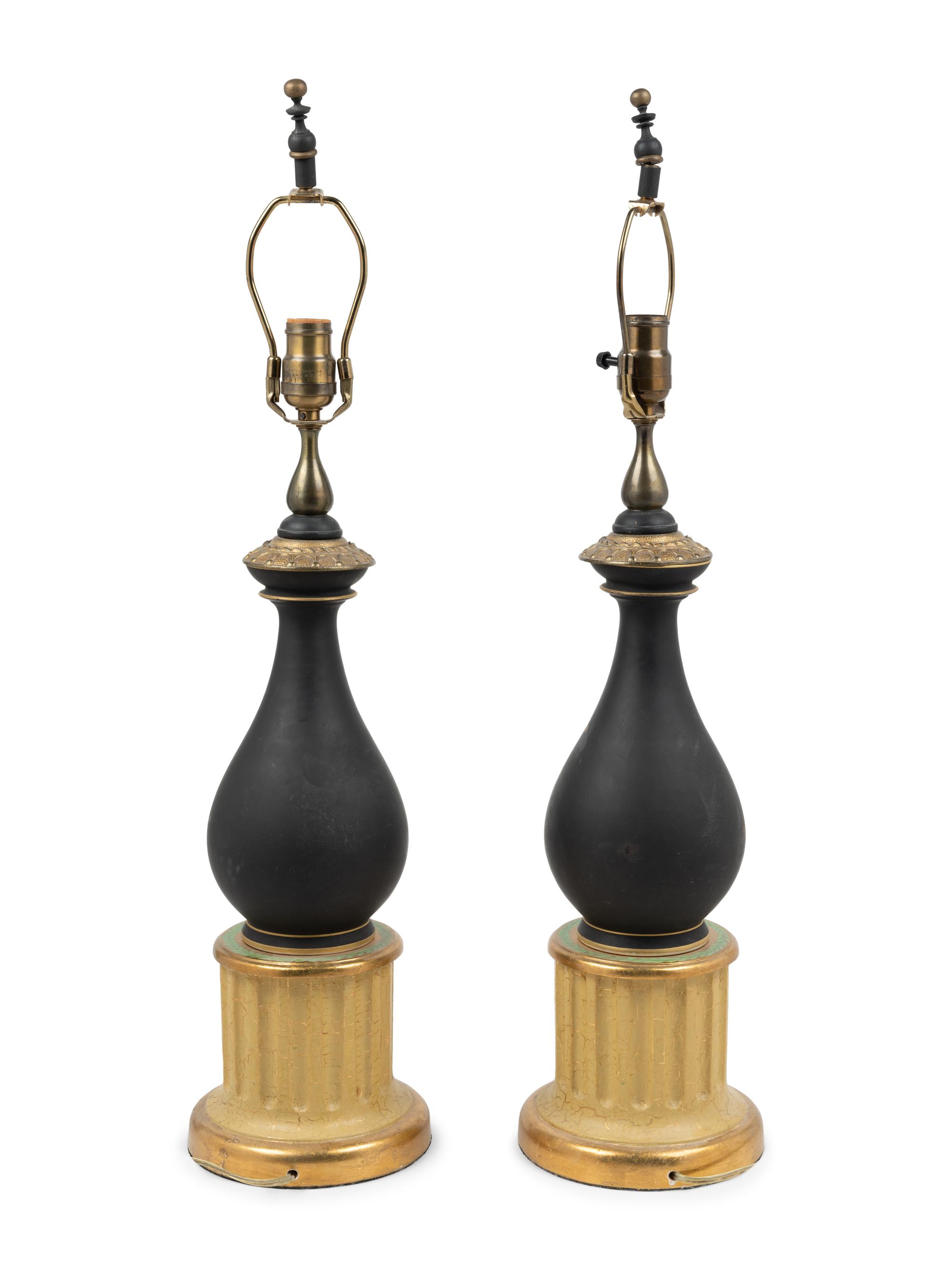 A Pair of Continental Porcelain and Giltwood Lamps