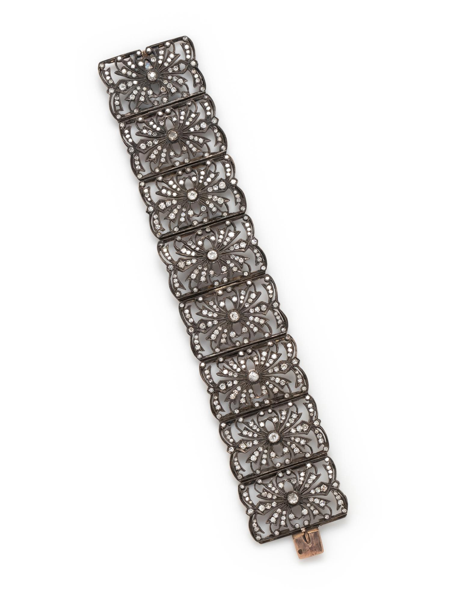 SILVER-TOPPED GOLD AND DIAMOND BRACELET