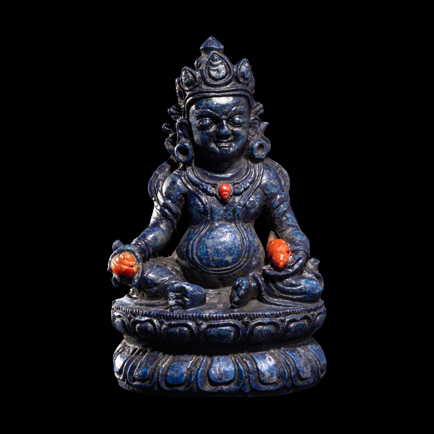 A Sino-Tibetan Carved Lapis Lazuli Figure of Jambhalā