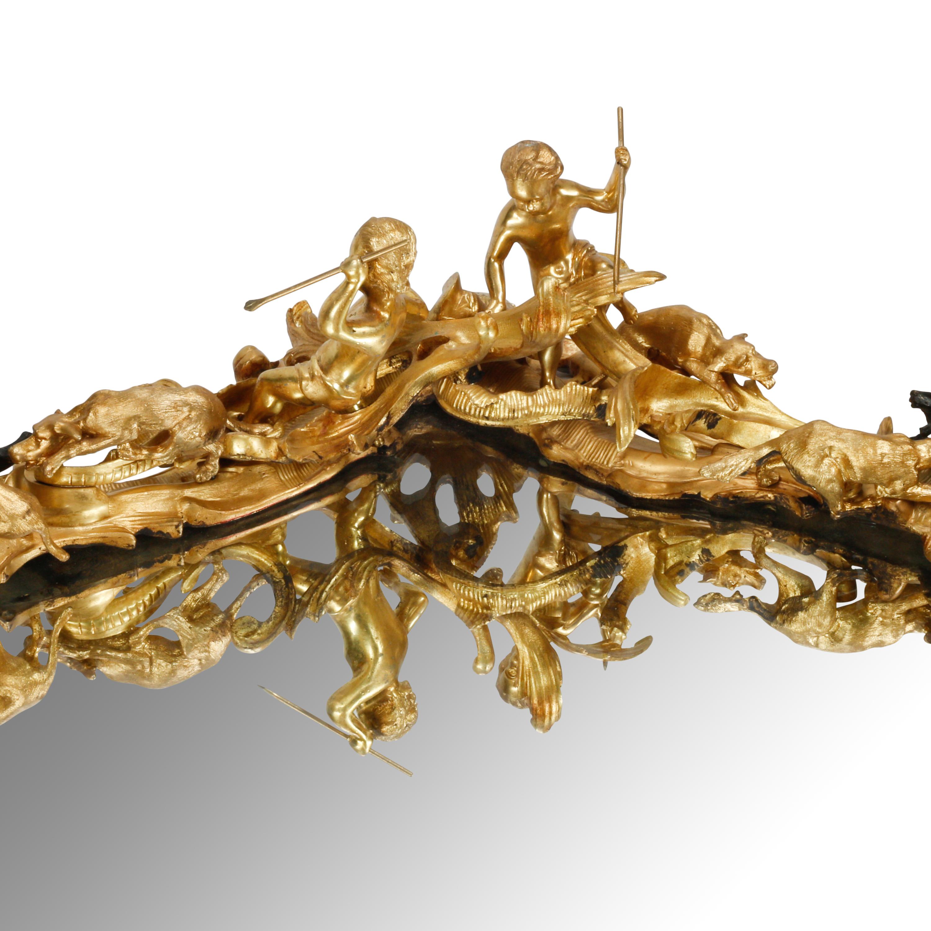A Large Rococo Style Gilt and Patinated Bronze Surtout de Table
