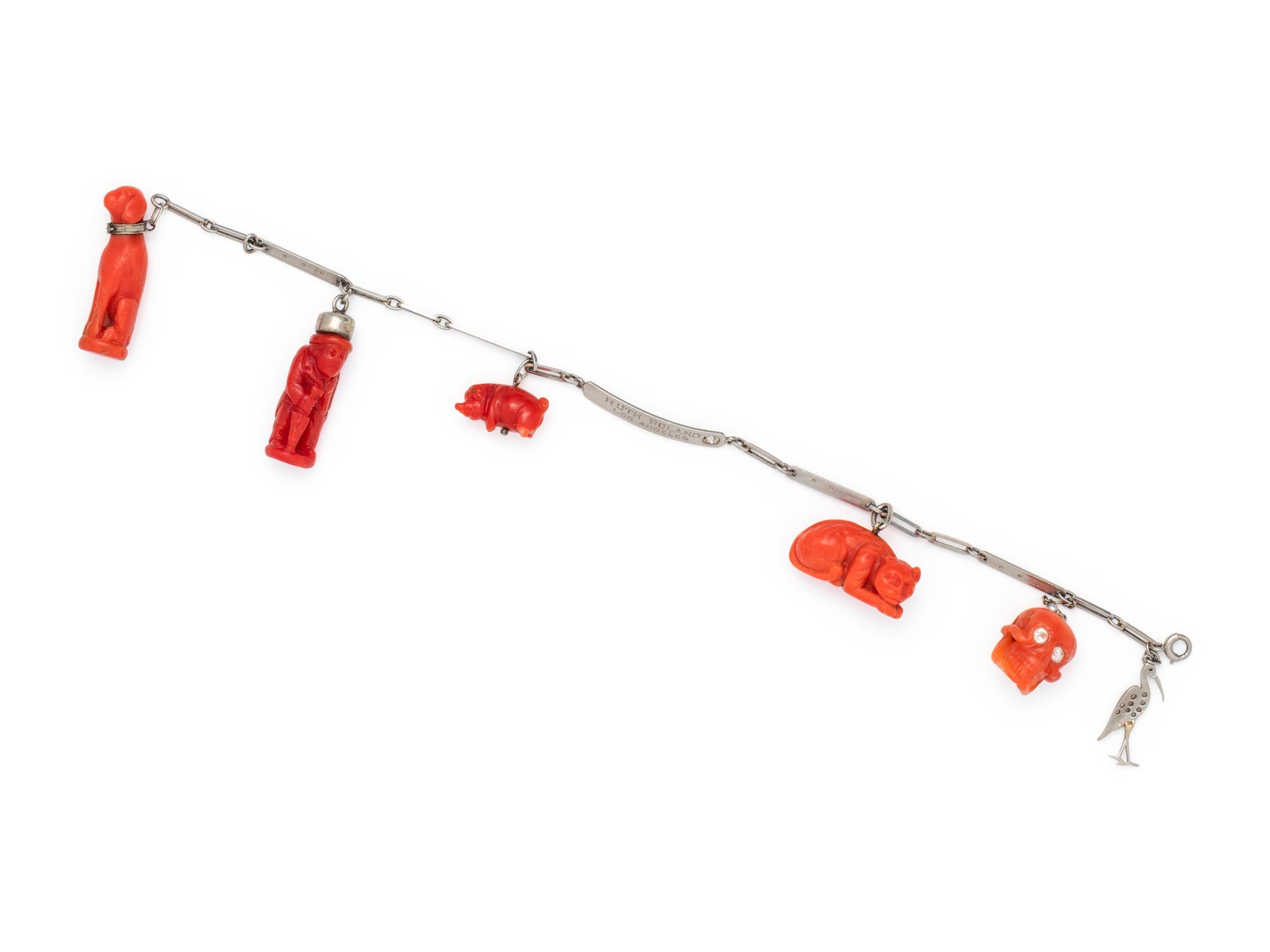 PLATINUM AND CORAL CHARM BRACELET
