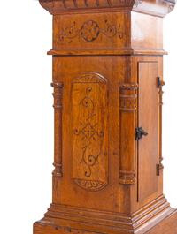 An Aesthetic Movement Carved Oak Pedestal