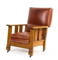An Arts and Crafts Oak Armchair Height 38 1/2 inches.