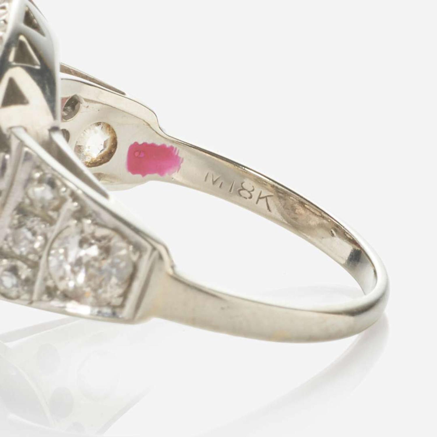 An 18K White Gold and Diamond Ring
