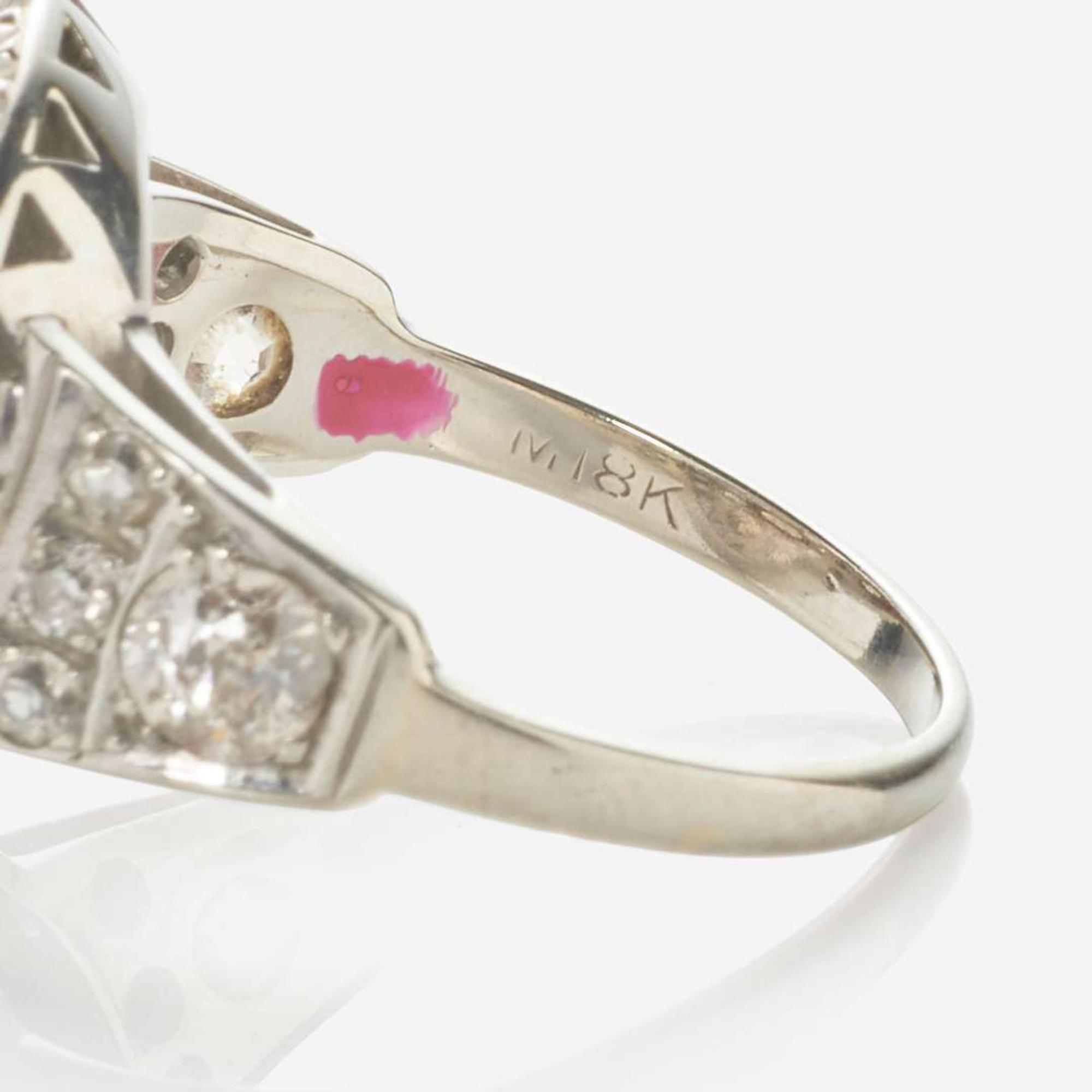 An 18K White Gold and Diamond Ring