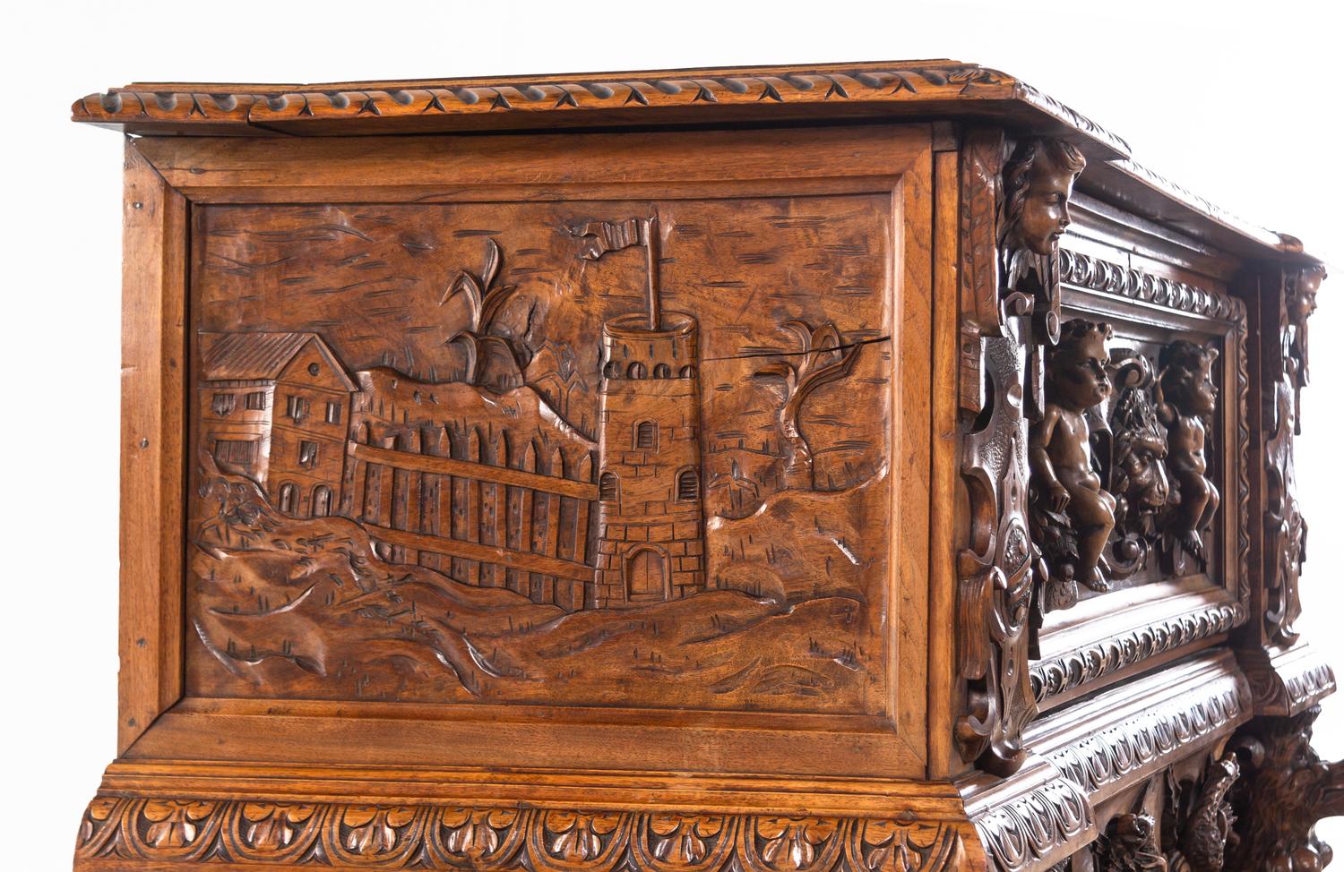 An Italian Renaissance Revival Carved Walnut Cassone on Stand