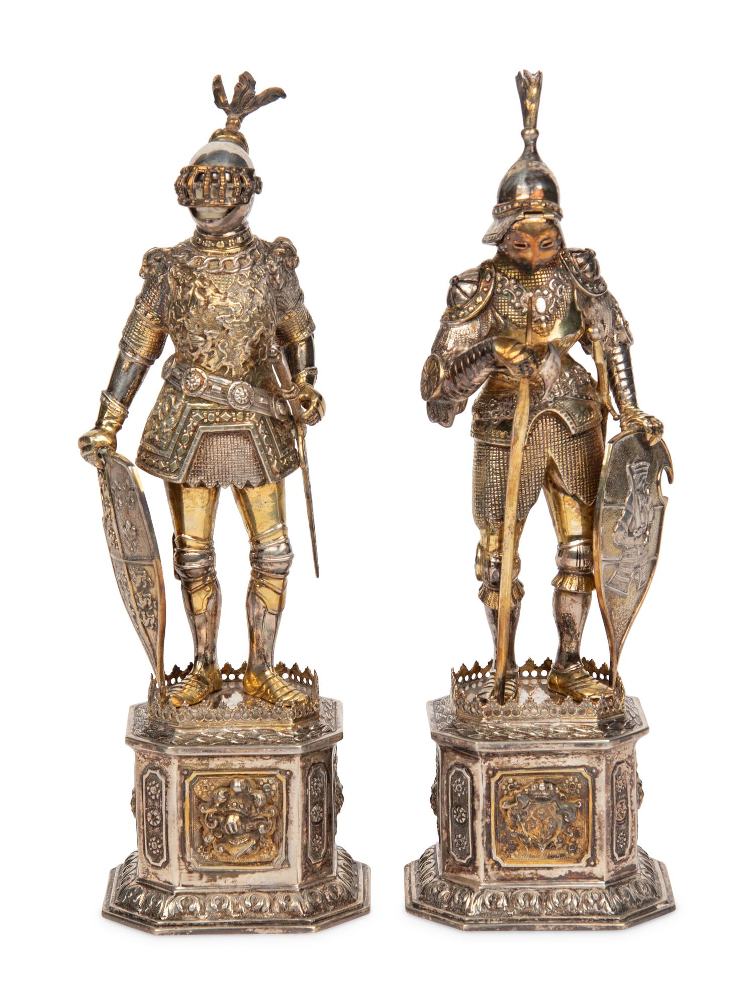 A Pair of German Silver and Parcel-Gilt Figures of Knights