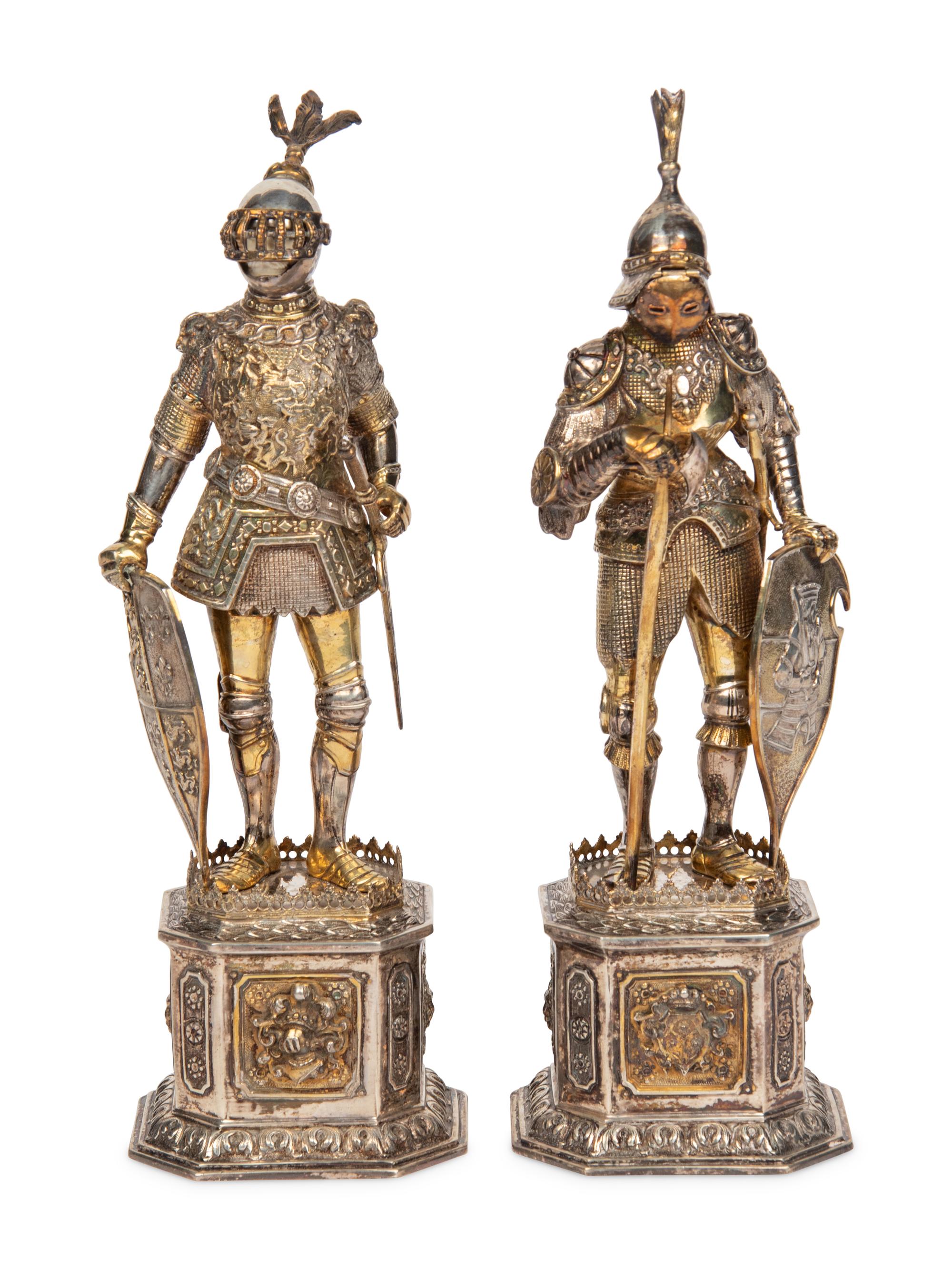A Pair of German Silver and Parcel-Gilt Figures of Knights