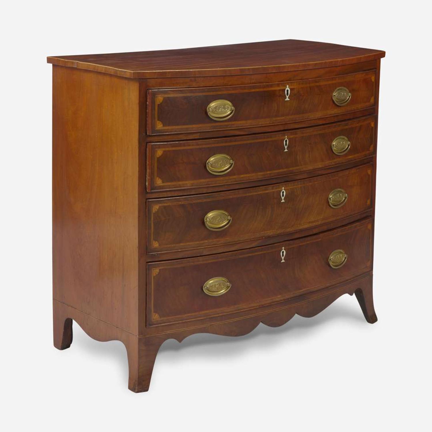 A Federal bowfront inlaid mahogany chest of drawers circa 1800