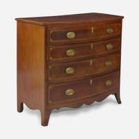 A Federal bowfront inlaid mahogany chest of drawers circa 1800
