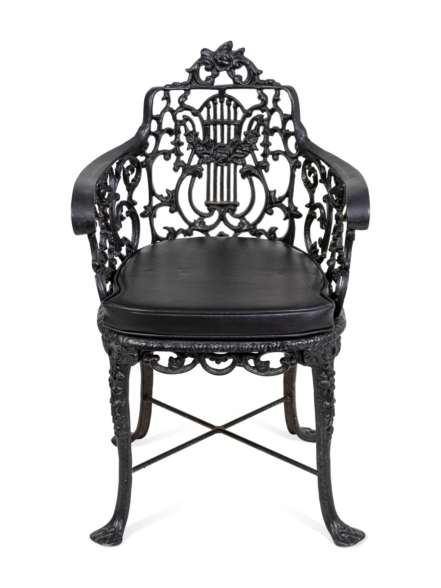 A Suite of Black Painted Metal Garden Furniture
