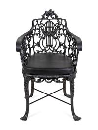 A Suite of Black Painted Metal Garden Furniture