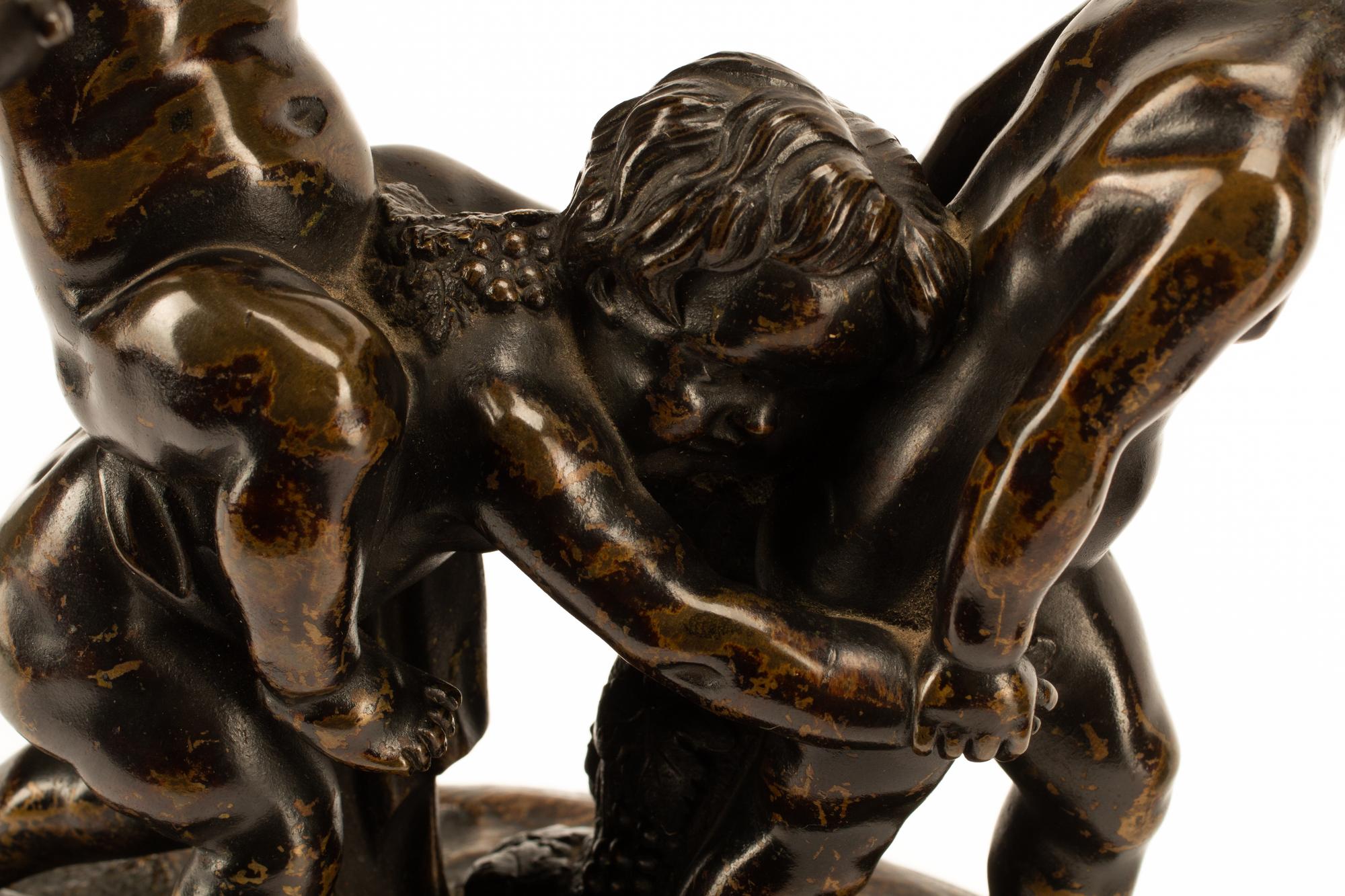 A Pair of French Patinated Bronze Figural Groups