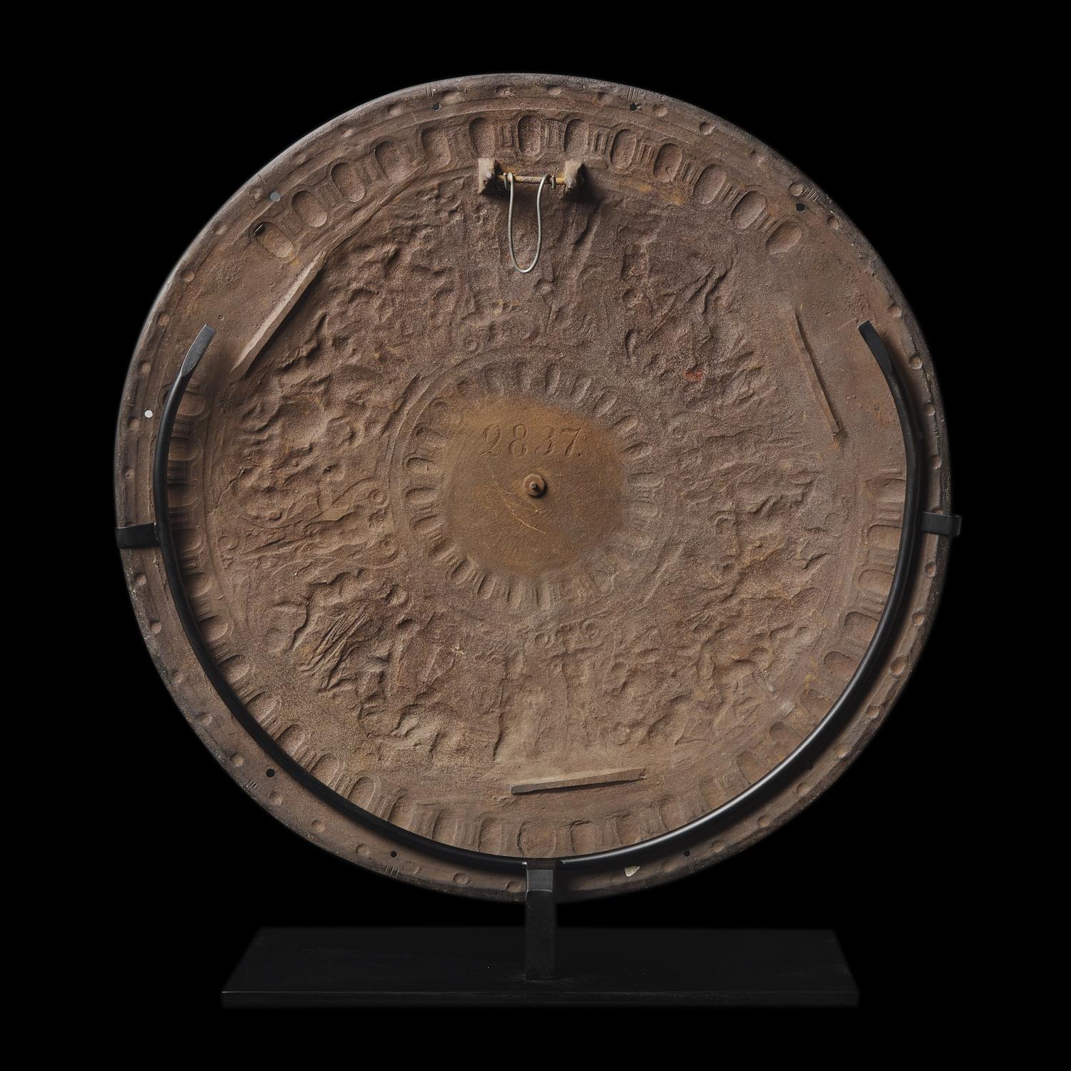 A Victorian Iron Parade Shield with Scenes from the Life of Julius Caesar