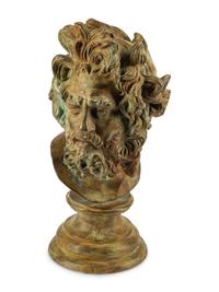 A Continental Patinated Bronze Head of a Man