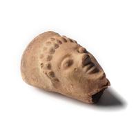 A Greek Terracotta Face Fragment