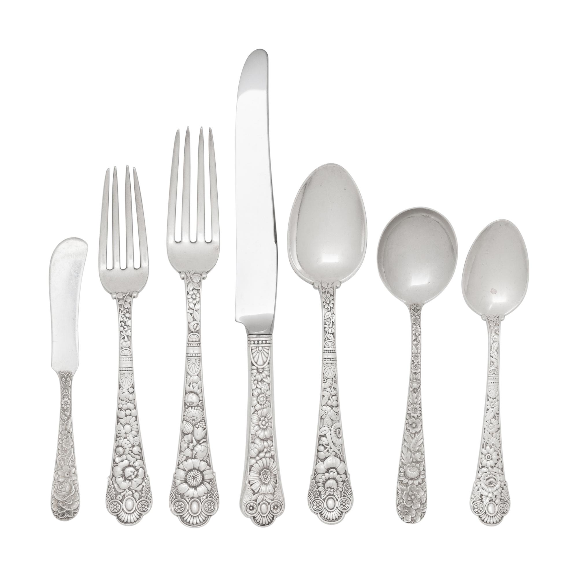 A Gorham Cluny Silver Flatware Service with S. Kirk and Son Repousse Silver Flatware and Serving Articles