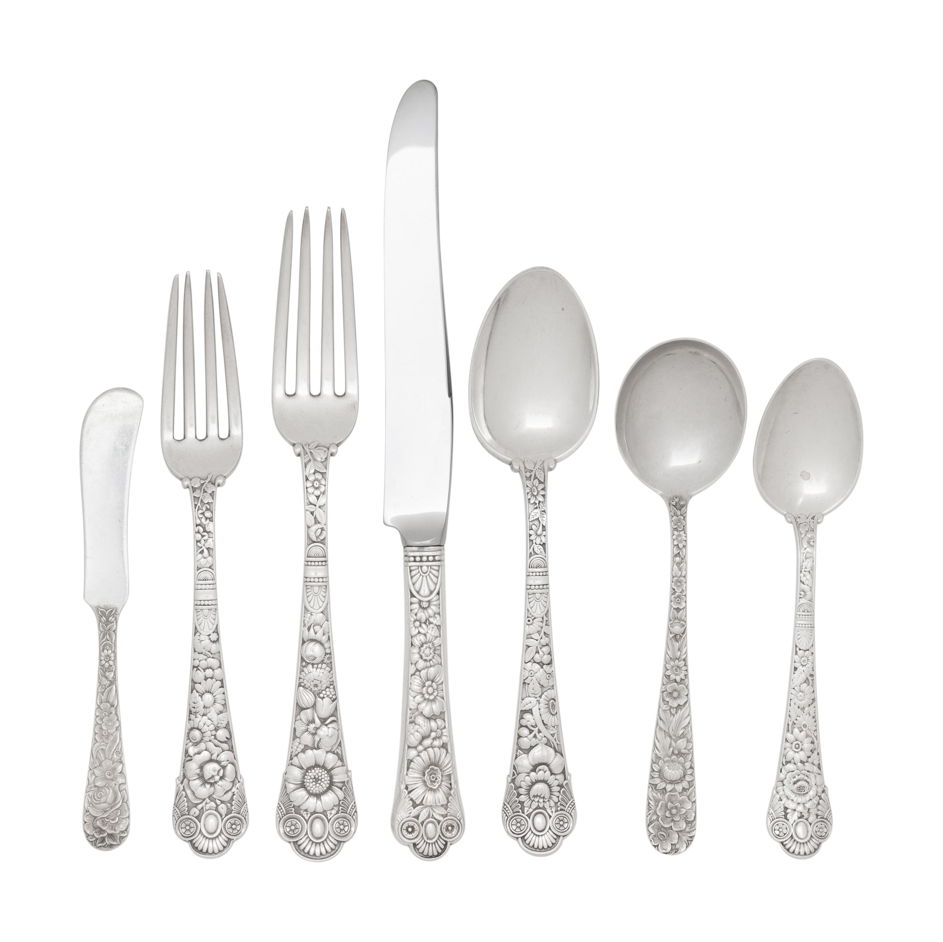 A Gorham Cluny Silver Flatware Service with S. Kirk and Son Repousse Silver Flatware and Serving Articles