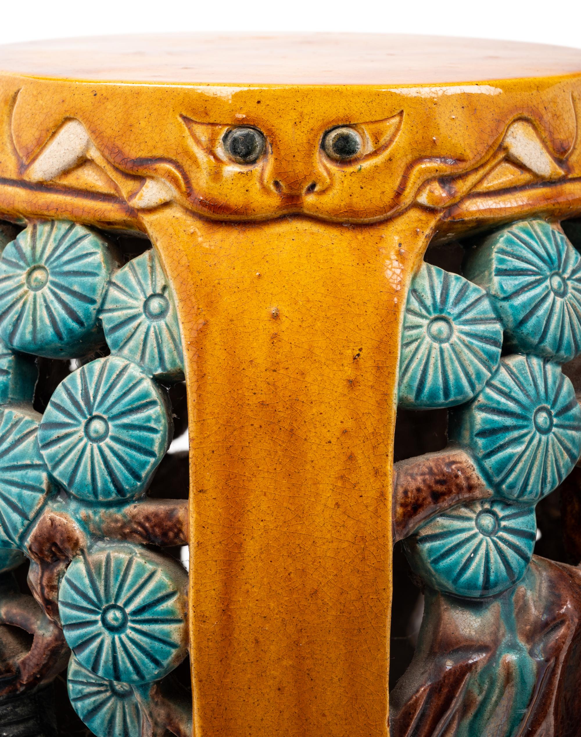 A Pair of Chinese Yellow, Turquoise and Purple Glazed Porcelain Garden Seats