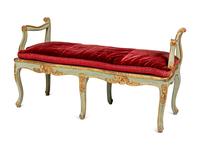 A Pair of Louis XV Green-Painted and Parcel-Gilt Cane Seat Window Benches