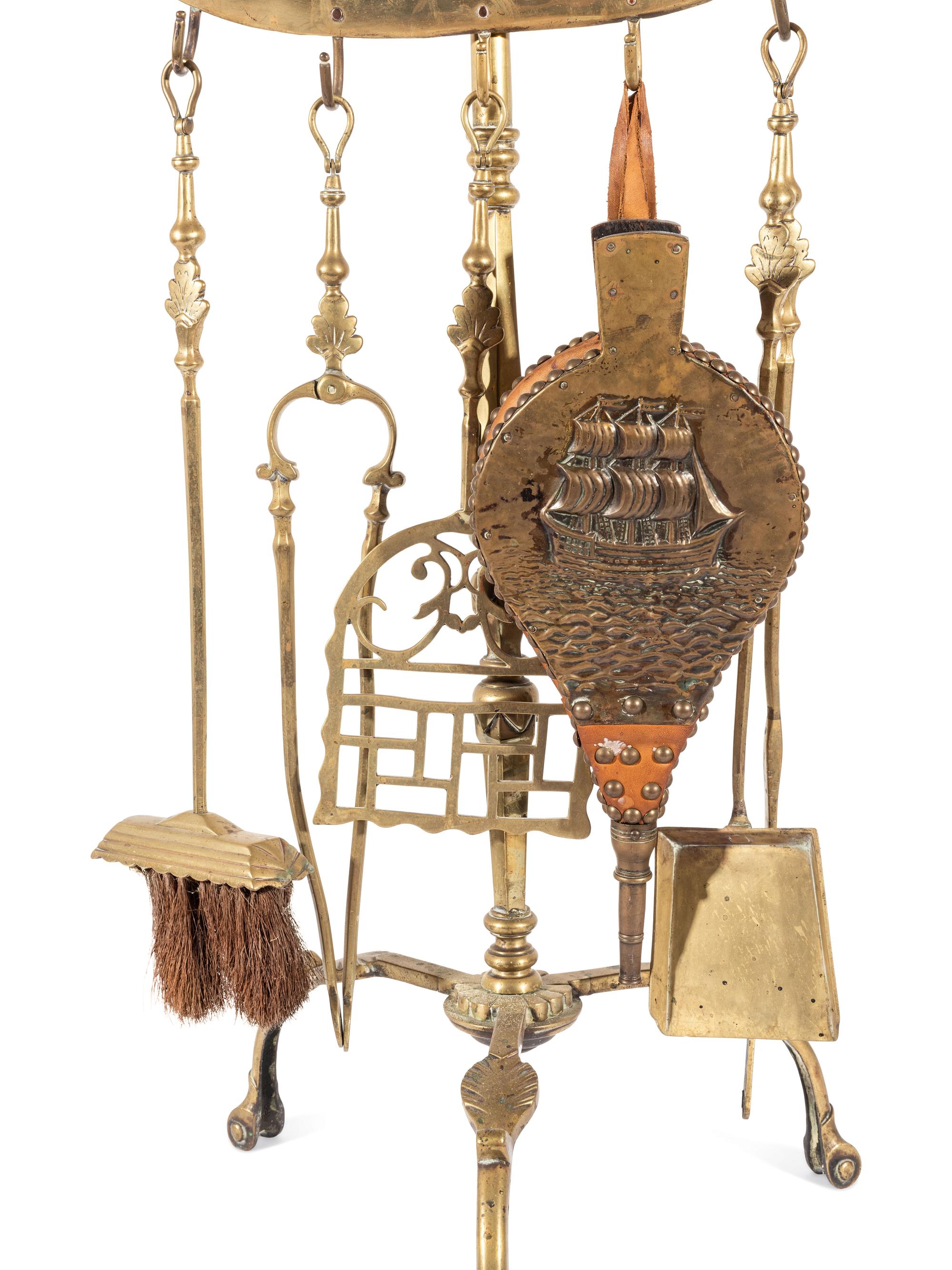A Brass Nautical Fireplace Tool Set on Stand