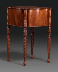A Classical Carved Mahogany Three Drawer Work Table