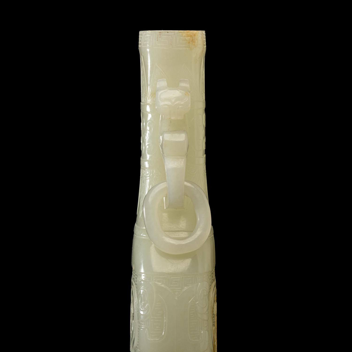 A Chinese Pale Celadon Jade Flattened Vase, Late Qing/Republic Period 晚清/民國 青白玉仿古雙耳瓶