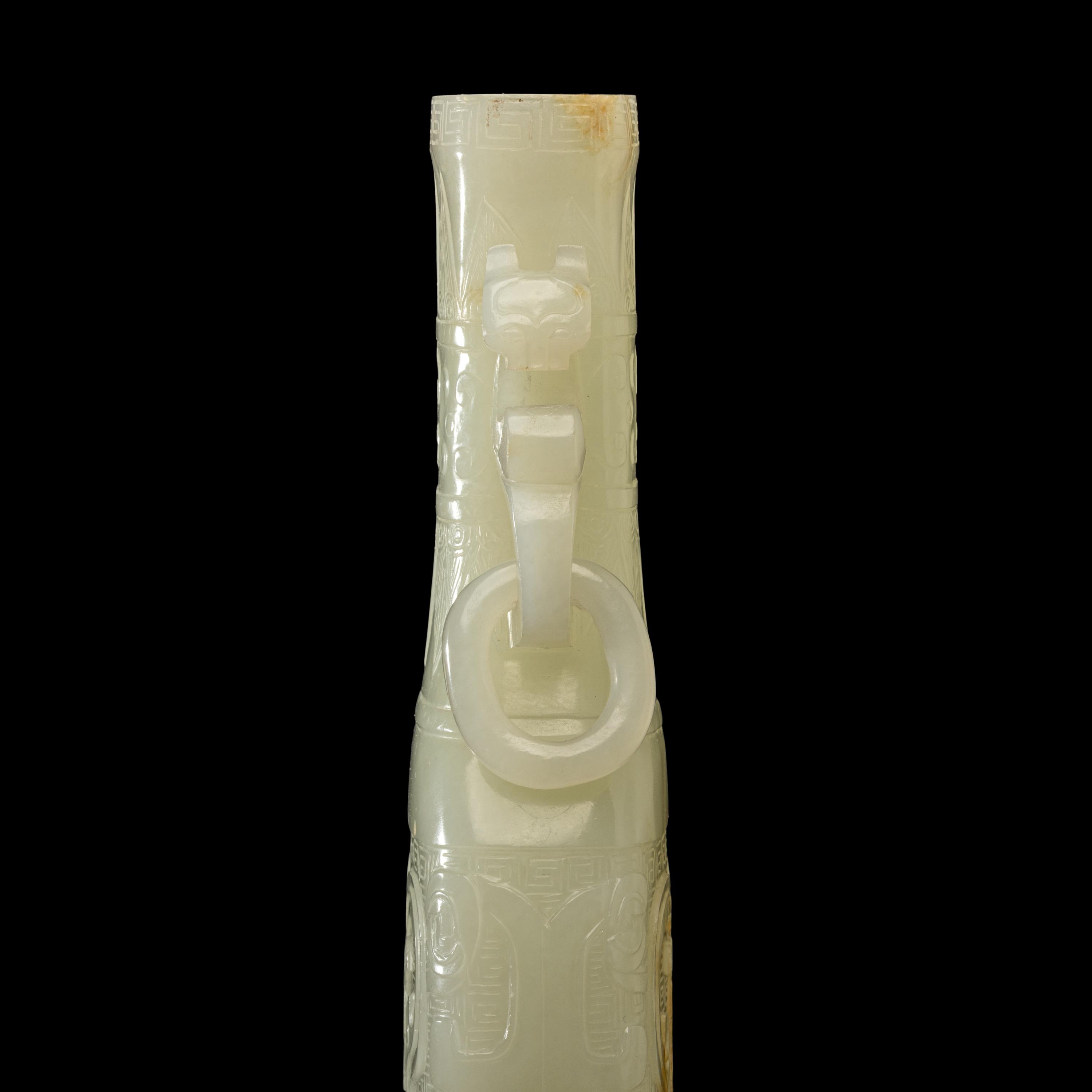 A Chinese Pale Celadon Jade Flattened Vase, Late Qing/Republic Period 晚清/民國 青白玉仿古雙耳瓶