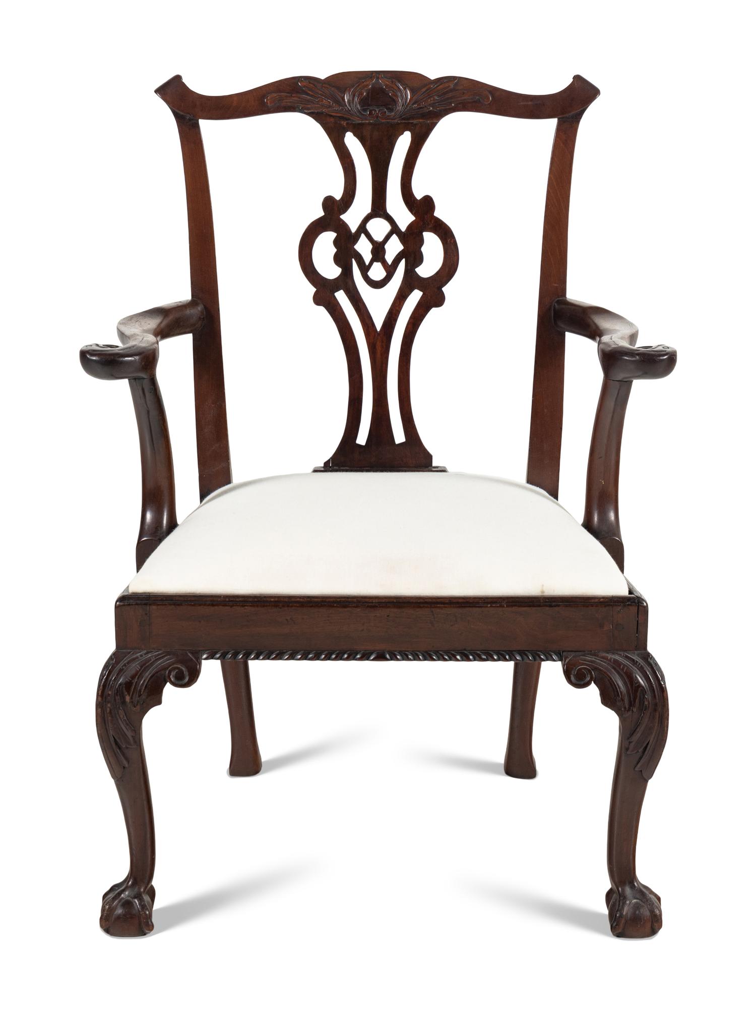 A George III Carved Walnut Open Armchair