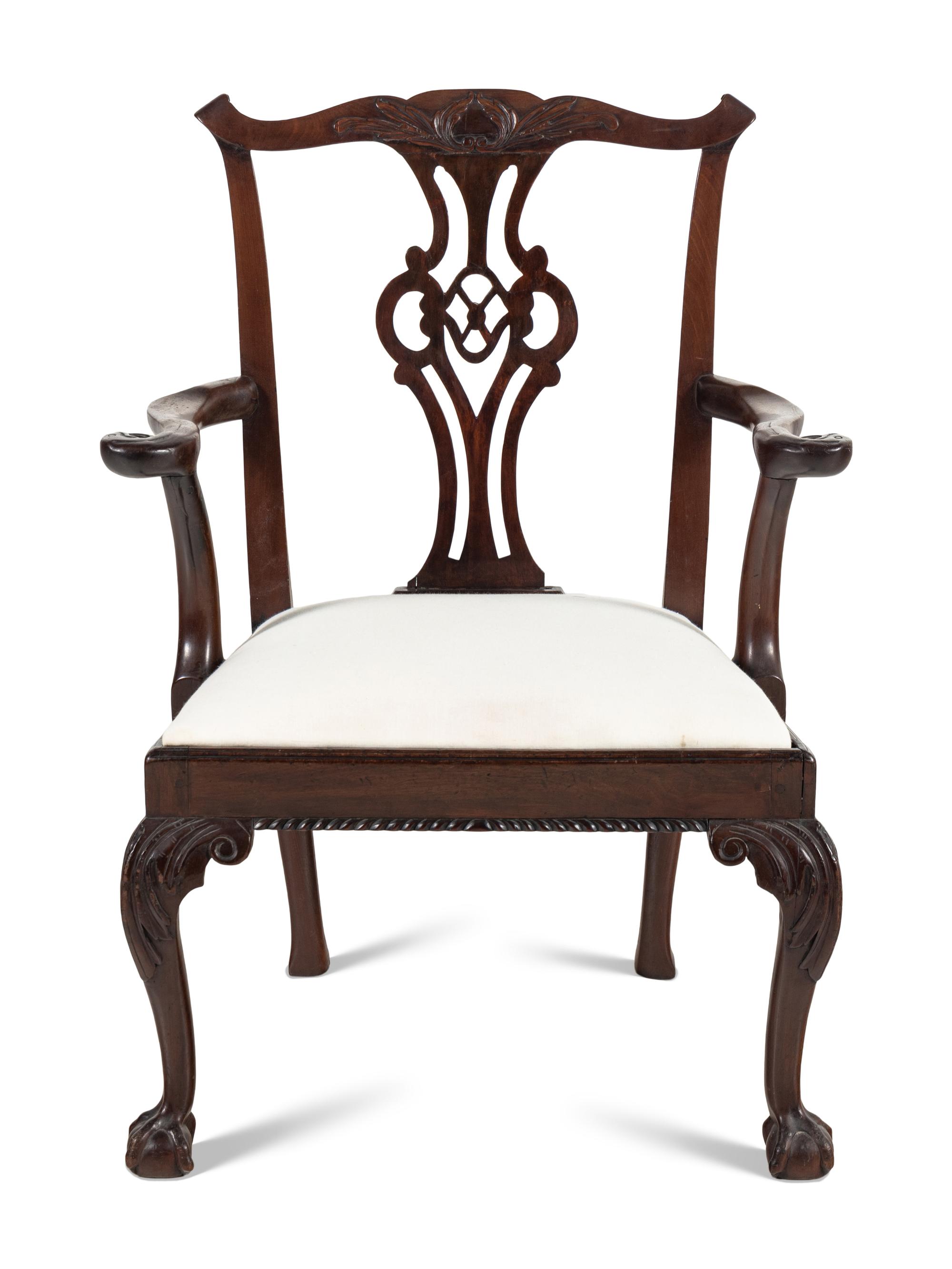 A George III Carved Walnut Open Armchair