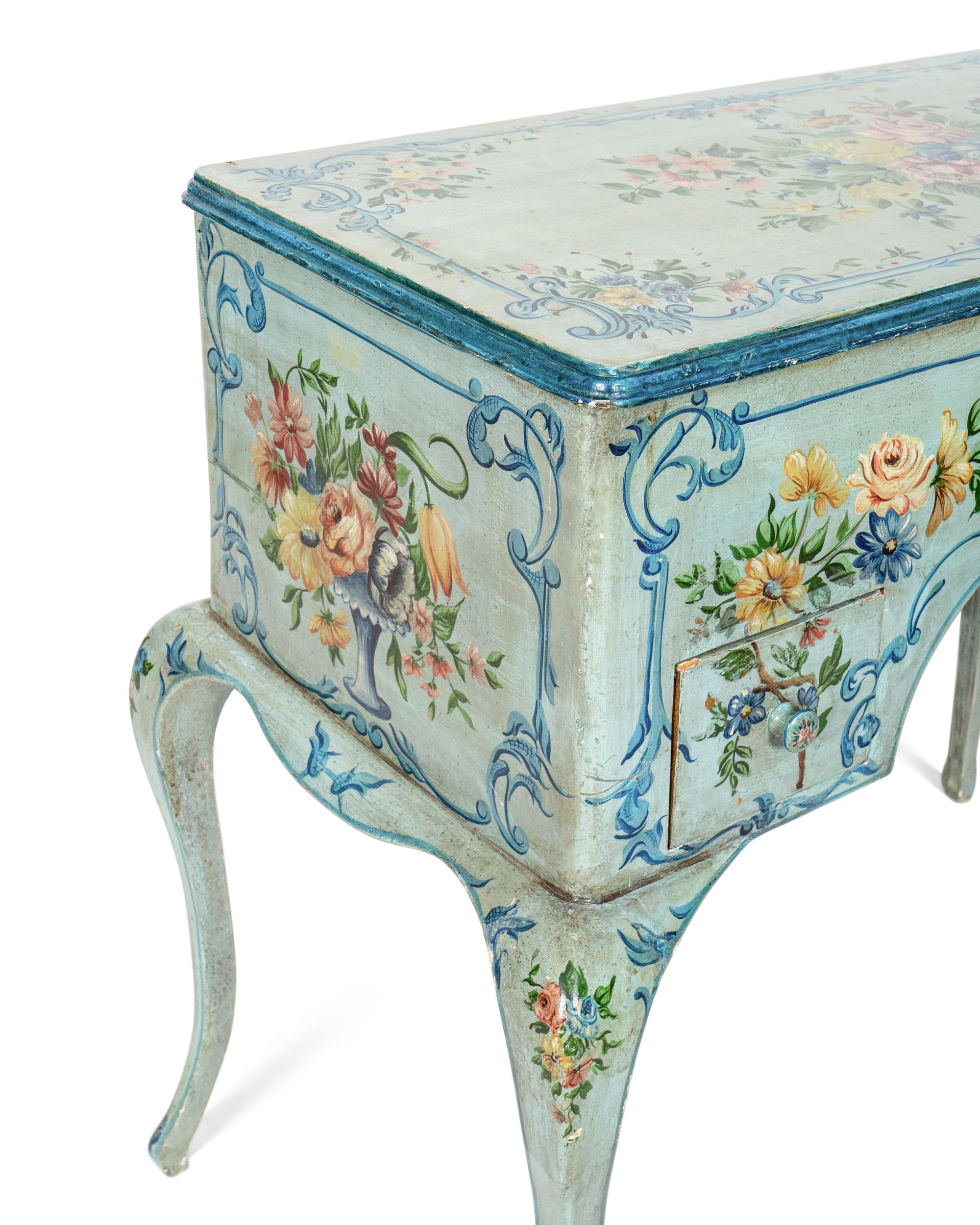 A Louis XV Style Painted Dressing Table with Polychromed Floral Decoration