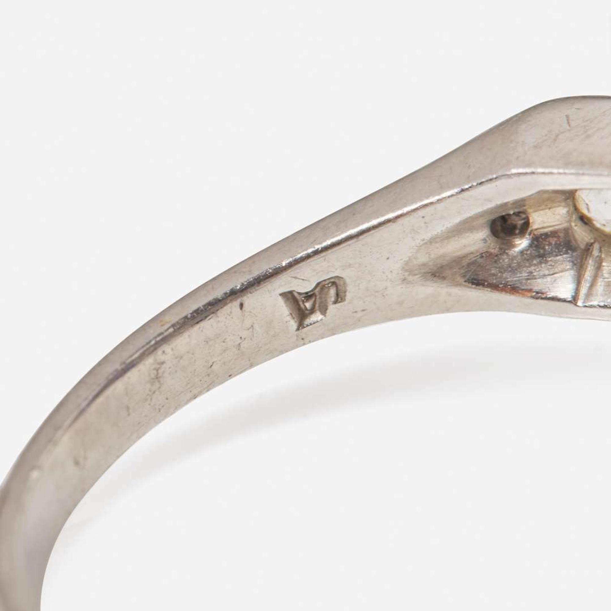 A Collection of Four Diamond and Sapphire Rings