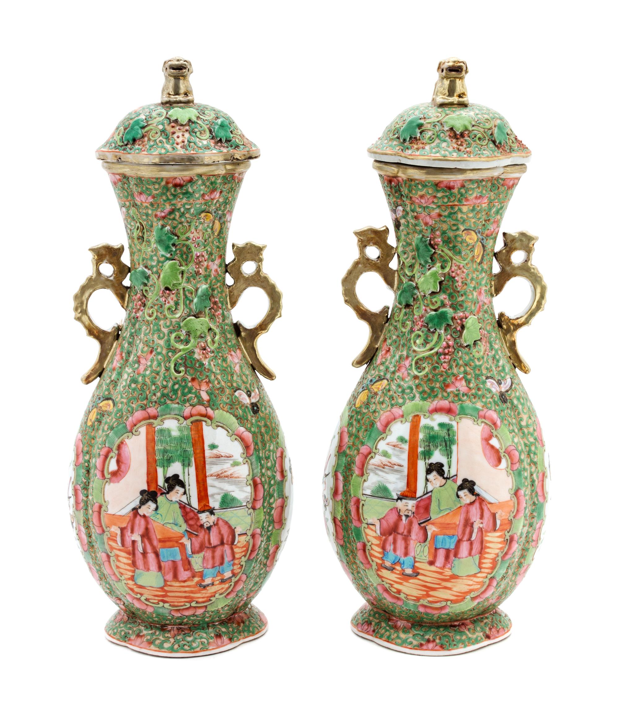 A Pair of Chinese Export Rose Famille Verte Vases with Covers Height 13 1/2 inches.