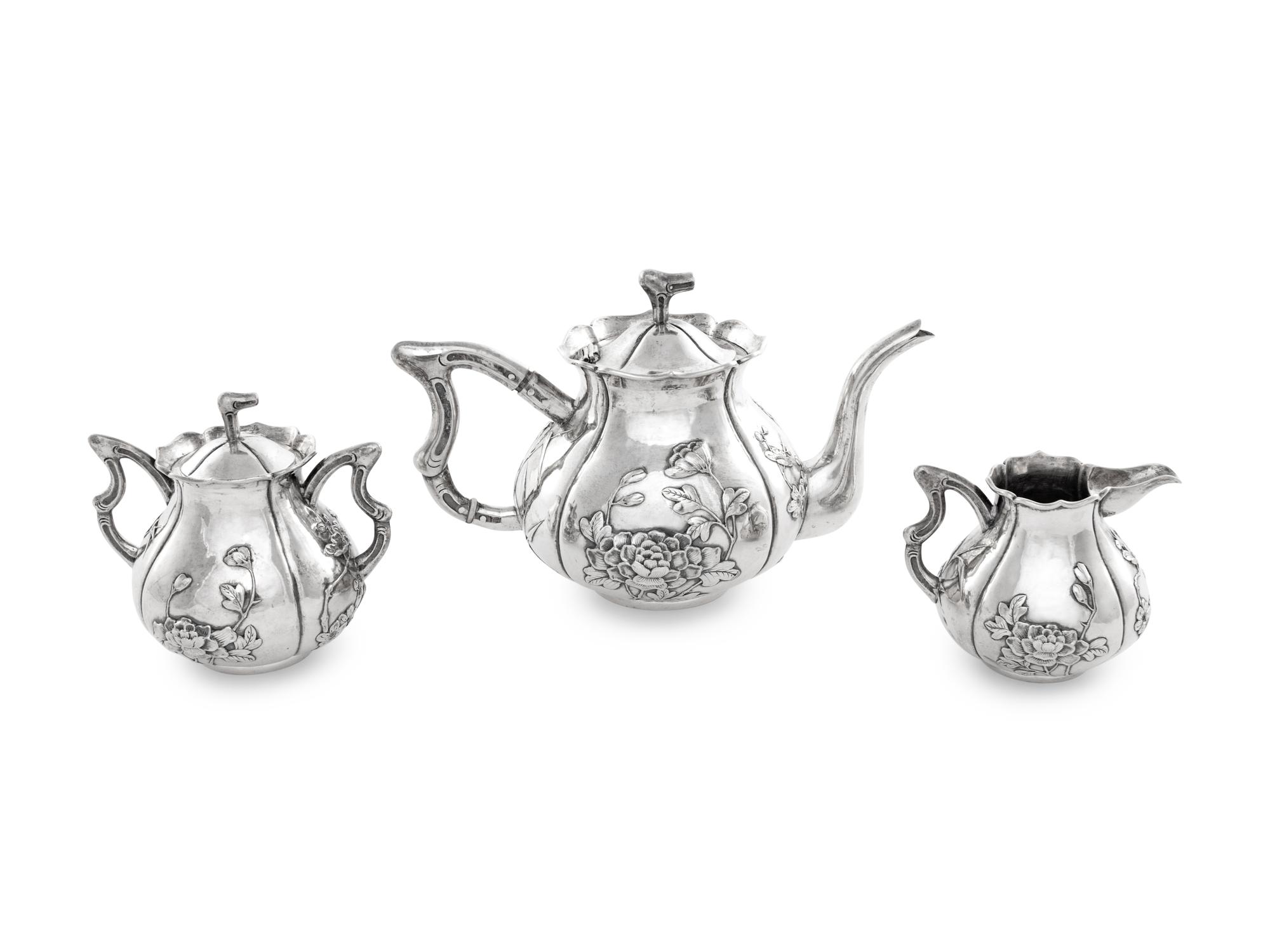 A Chinese Export Silver Three-Piece Tea Service