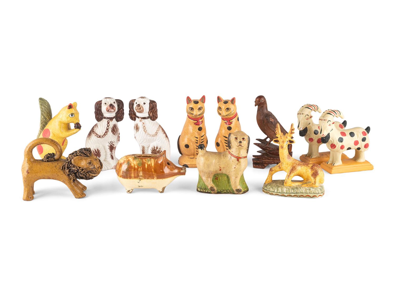 Twelve Contemporary Chalkware, Redware and Folk Carved Animal Figures