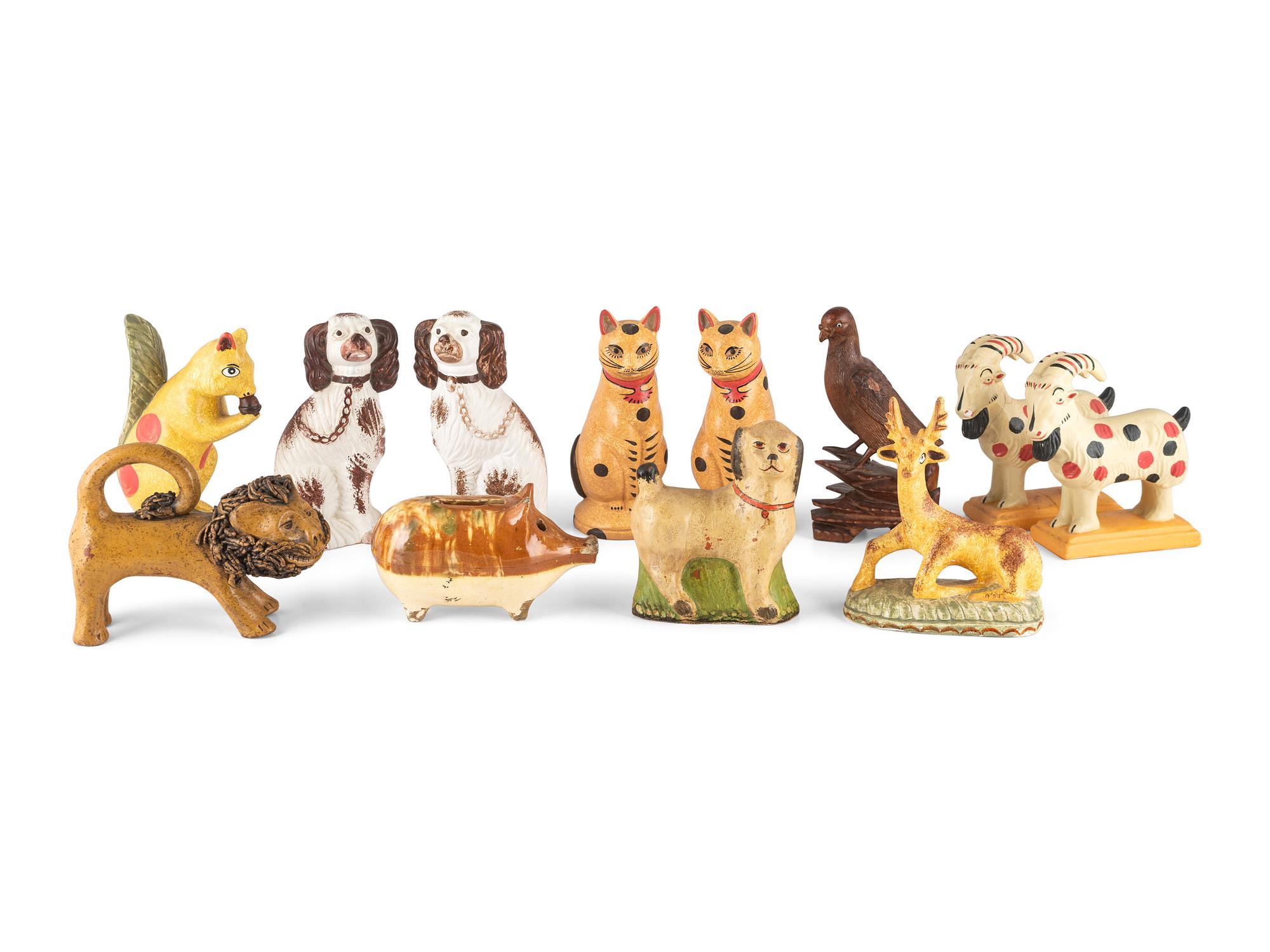 Twelve Contemporary Chalkware, Redware and Folk Carved Animal Figures
