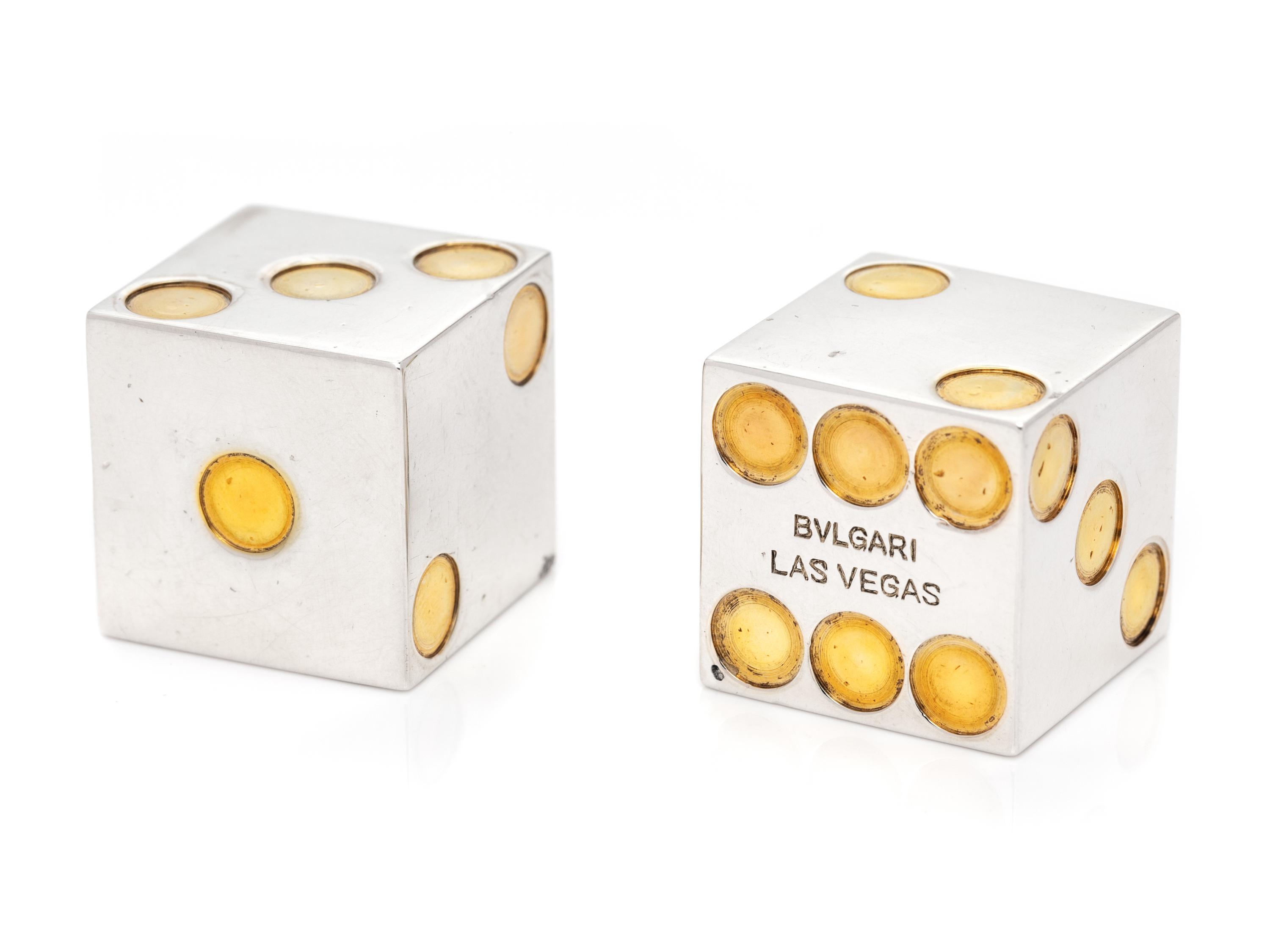 BVLGARI, PAIR OF STERLING SILVER AND GILT DICE AND POKER CHIP
