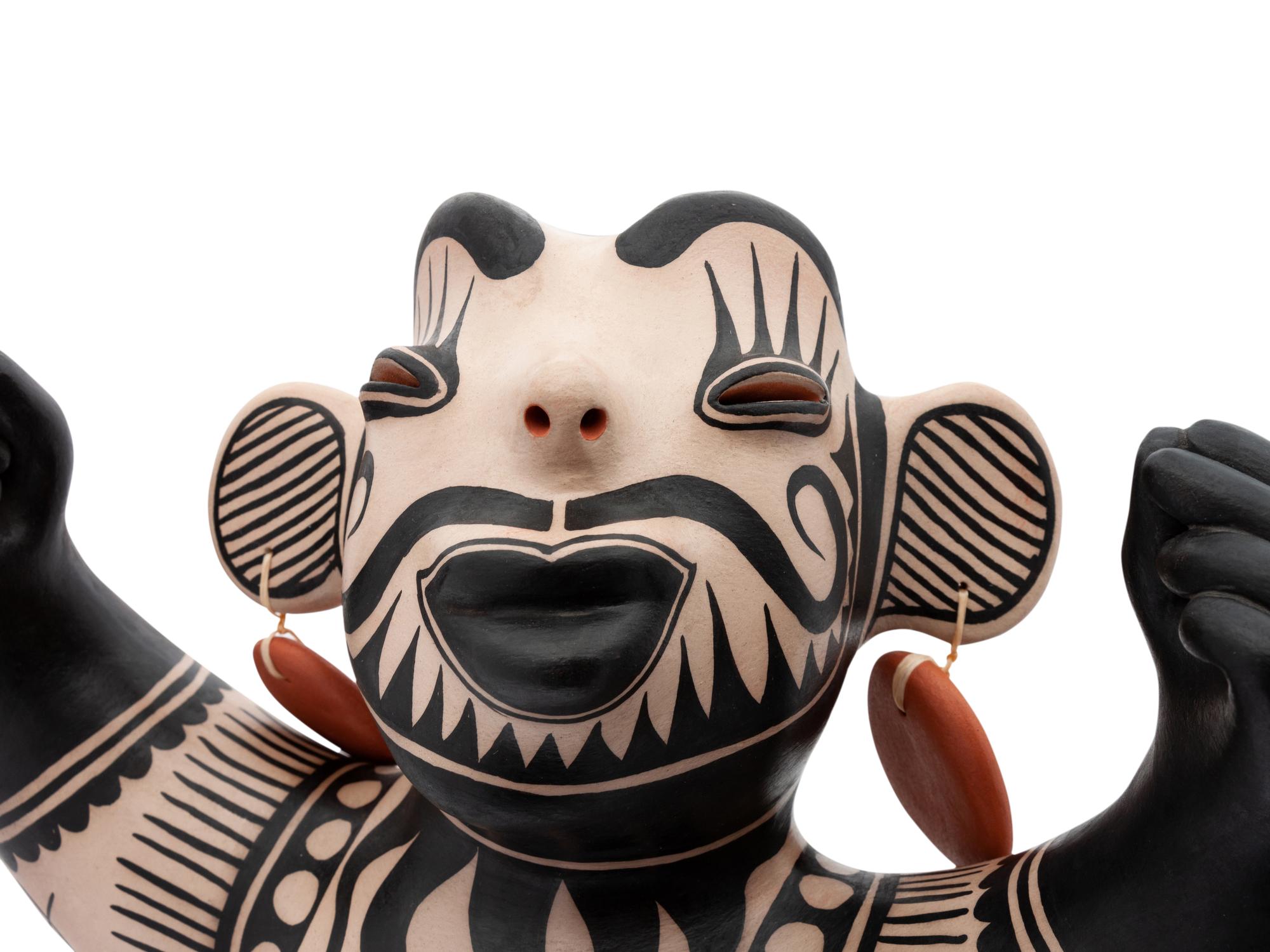 Untitled Pottery Mano Figure