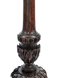 A Pair of Italian Carved Walnut Torchères