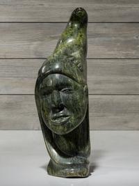 stone sculpture, woman and seal