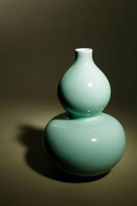 A Celadon Glazed Porcelain Gourd-Form Vase